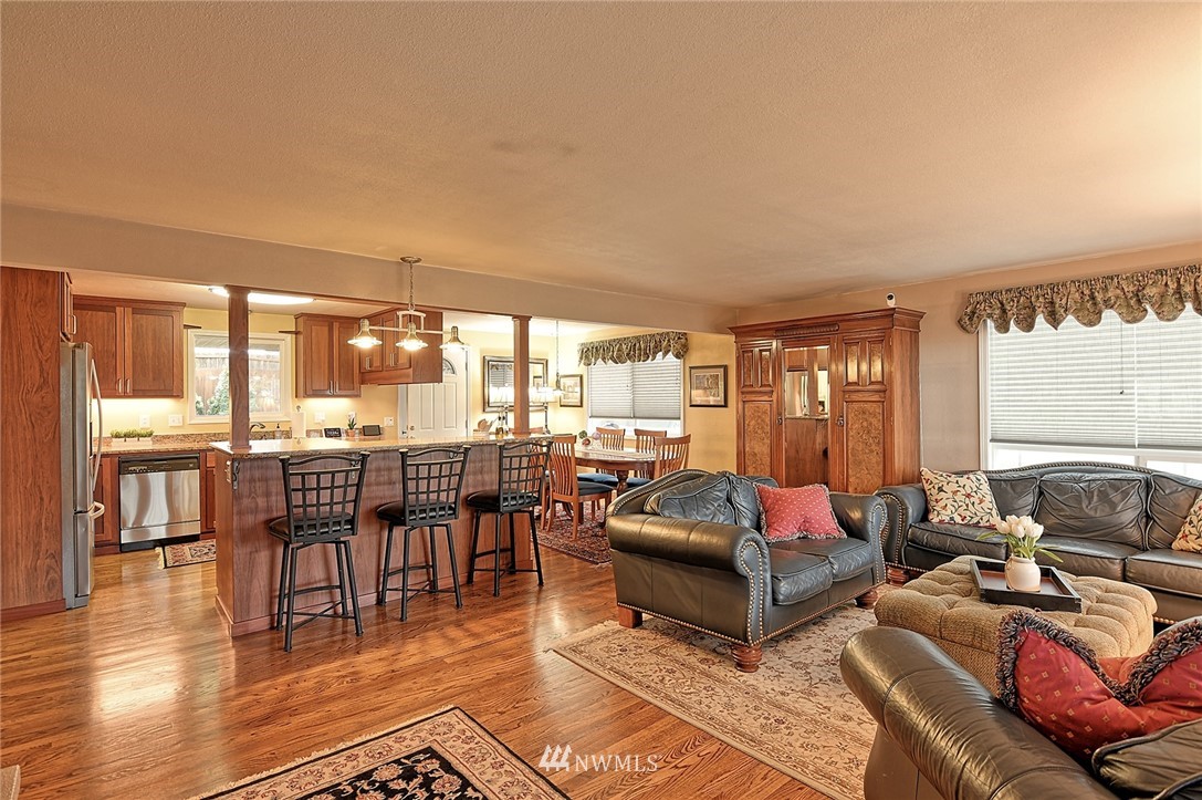 2104 Cedar Road Lake Stevens, WA 98258 - Photo 6 of 19 a living room with furniture and wooden floor