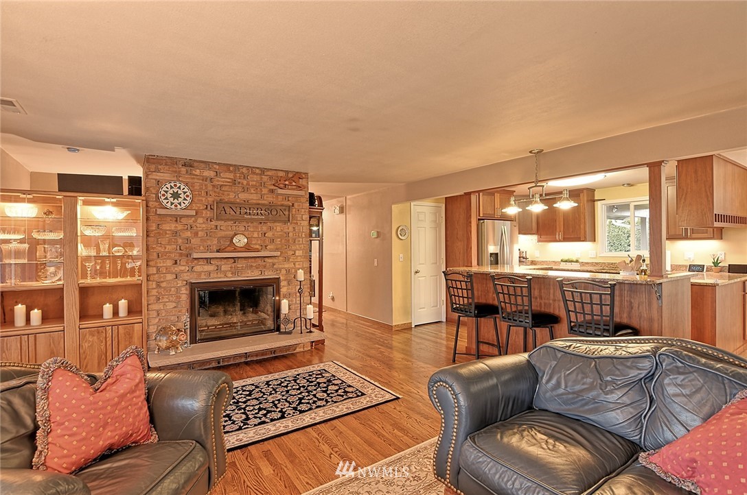 2104 Cedar Road Lake Stevens, WA 98258 - Photo 7 of 19 a living room with furniture and a fireplace