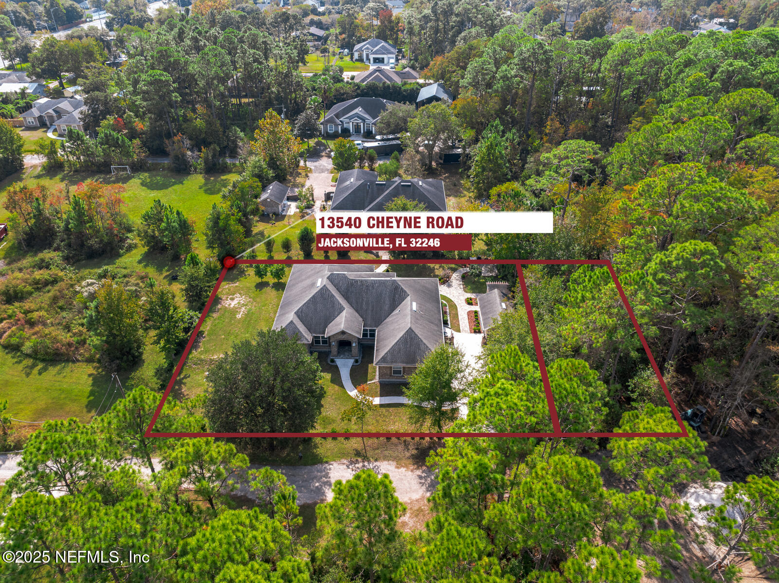 an aerial view of a house with a garden