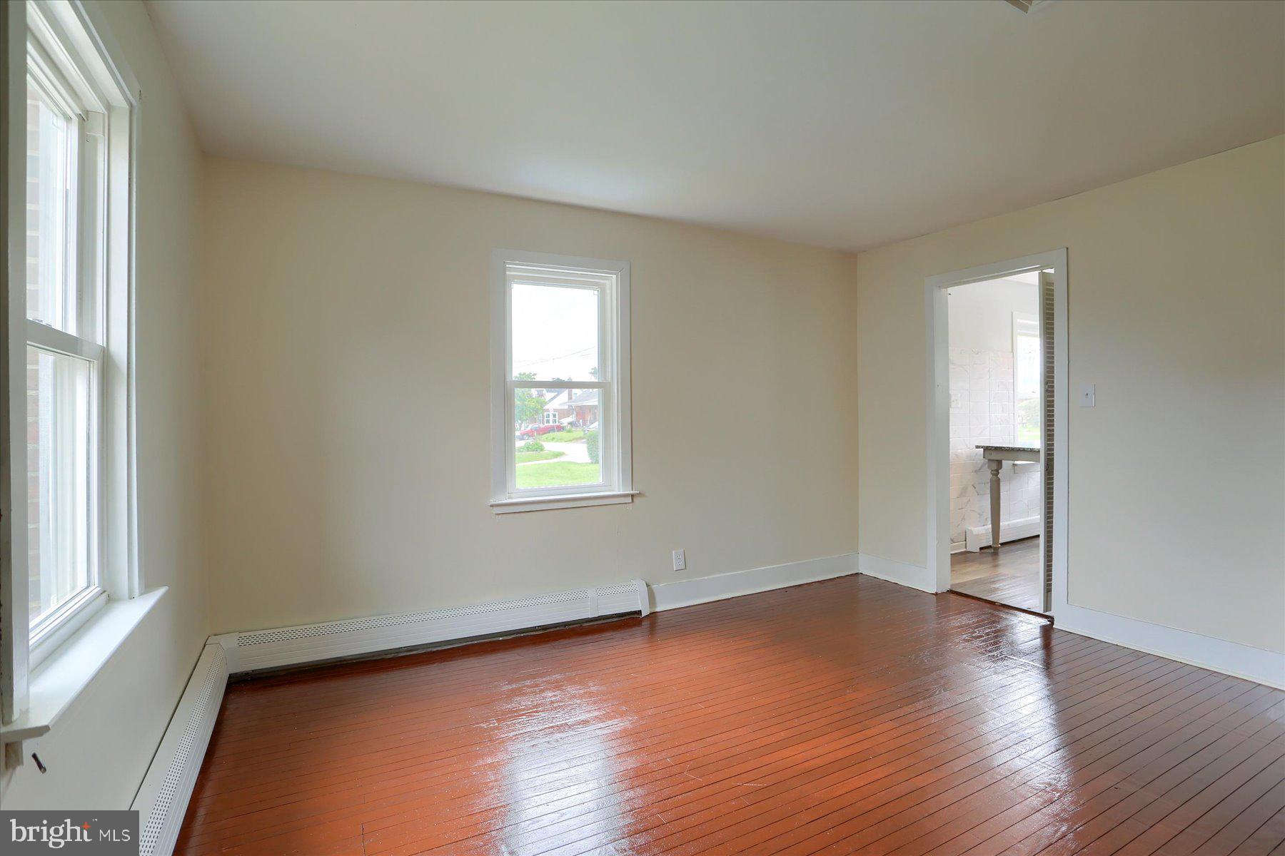 2158 Windsor Road Windsor, PA 17366 - Photo 14 of 30 an empty room with wooden floor and windows
