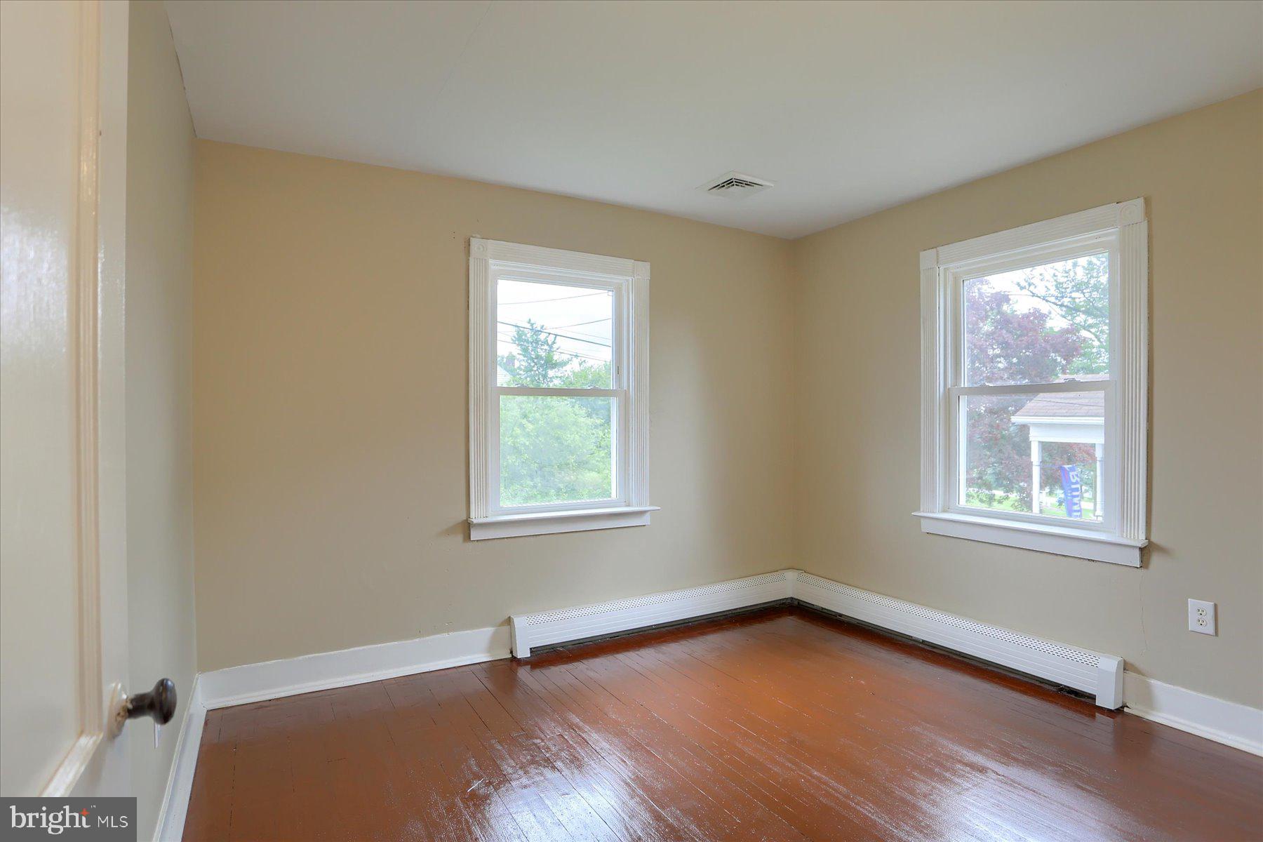 2158 Windsor Road Windsor, PA 17366 - Photo 18 of 30 an empty room with wooden floor and windows
