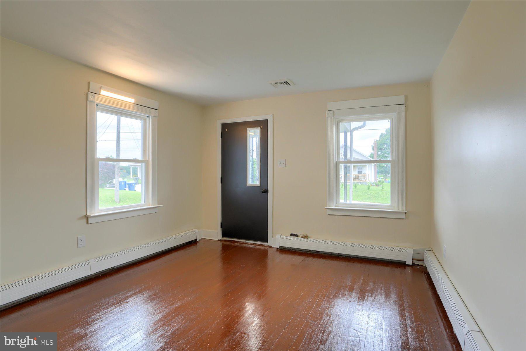 2158 Windsor Road Windsor, PA 17366 - Photo 9 of 30 an empty room with wooden floor and windows