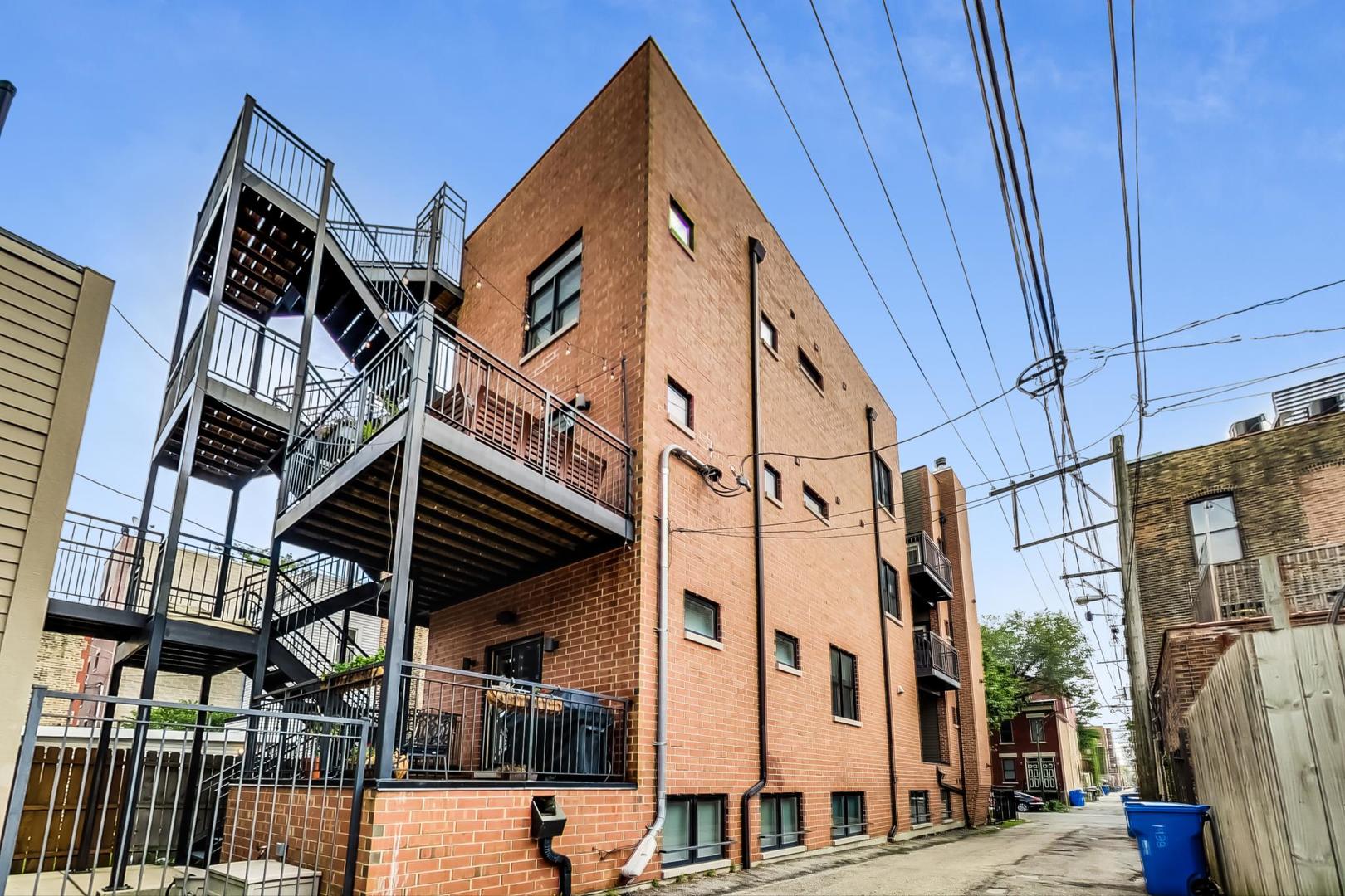 1944 West Thomas Street, Unit 2 Chicago, IL 60622 - Photo 26 of 28 a street view of a building
