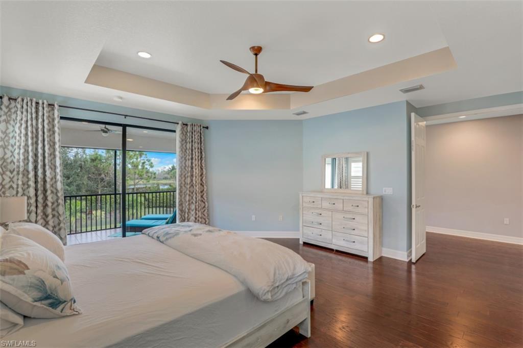 3082 Hudson Terrace Naples, FL 34119 - Photo 22 of 35 a bedroom with a bed and a large window