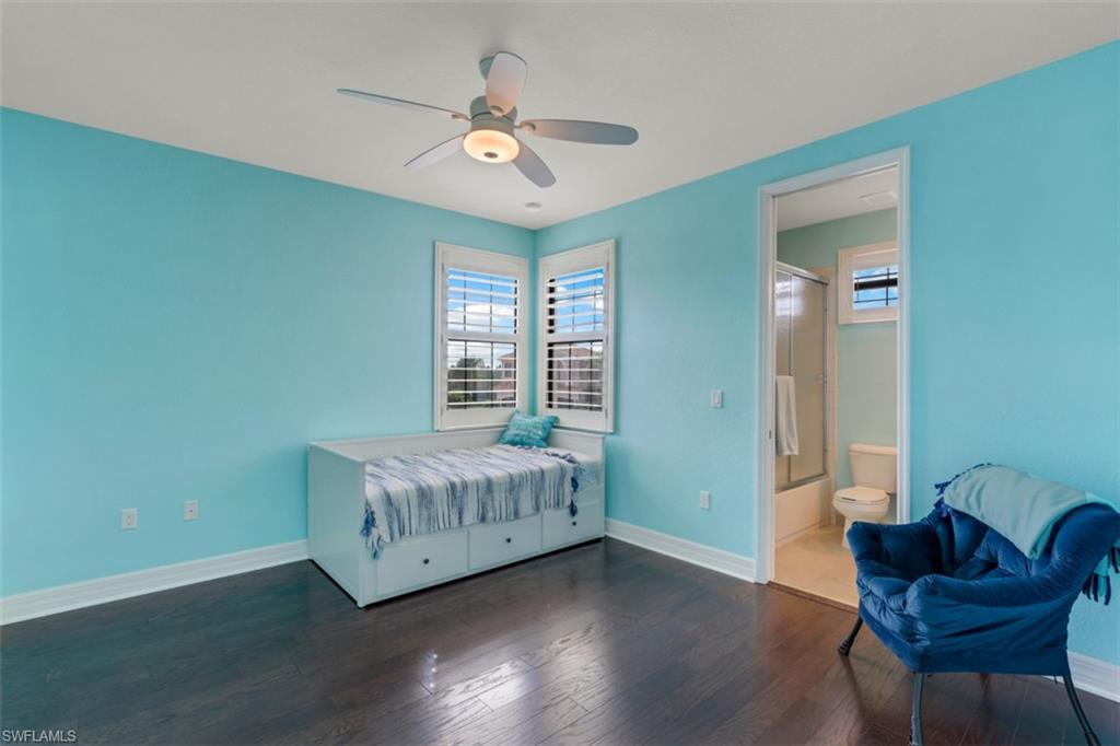 3082 Hudson Terrace Naples, FL 34119 - Photo 31 of 35 a living room with furniture and a window