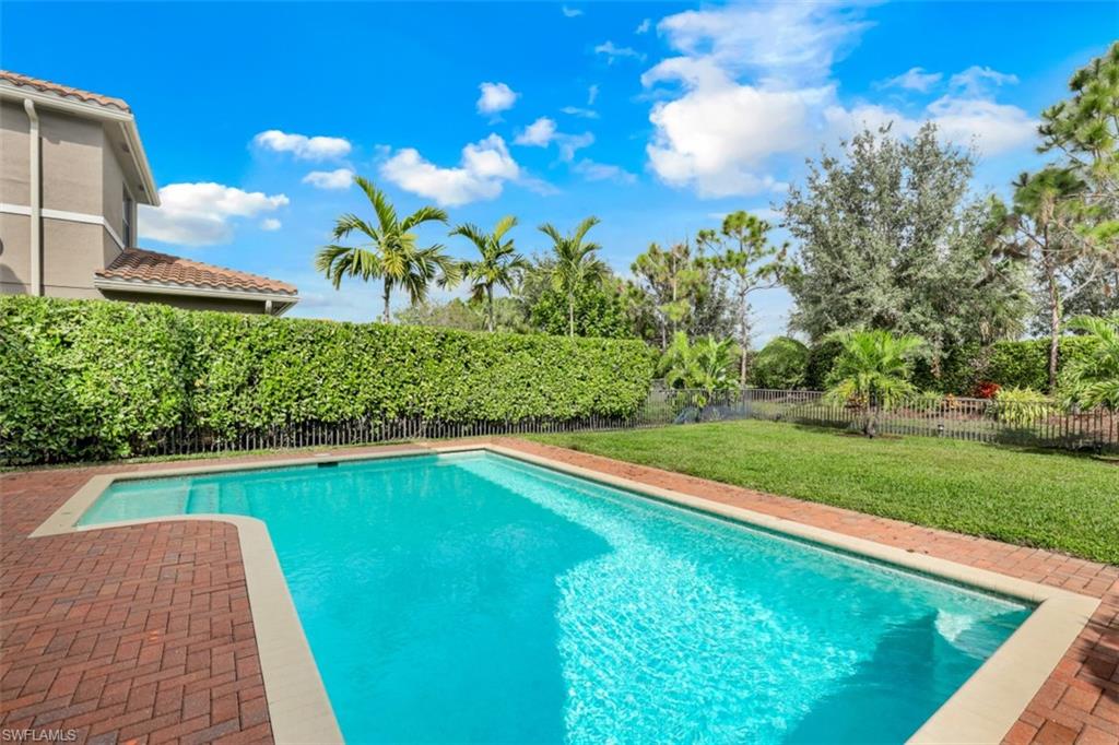 3082 Hudson Terrace Naples, FL 34119 - Photo 7 of 35 a view of swimming pool with a yard