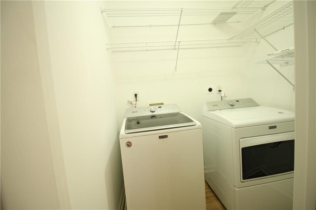 3343 Mill Grove Terrace Dacula, GA 30019 - Photo 20 of 28 a utility room with dryer and washer