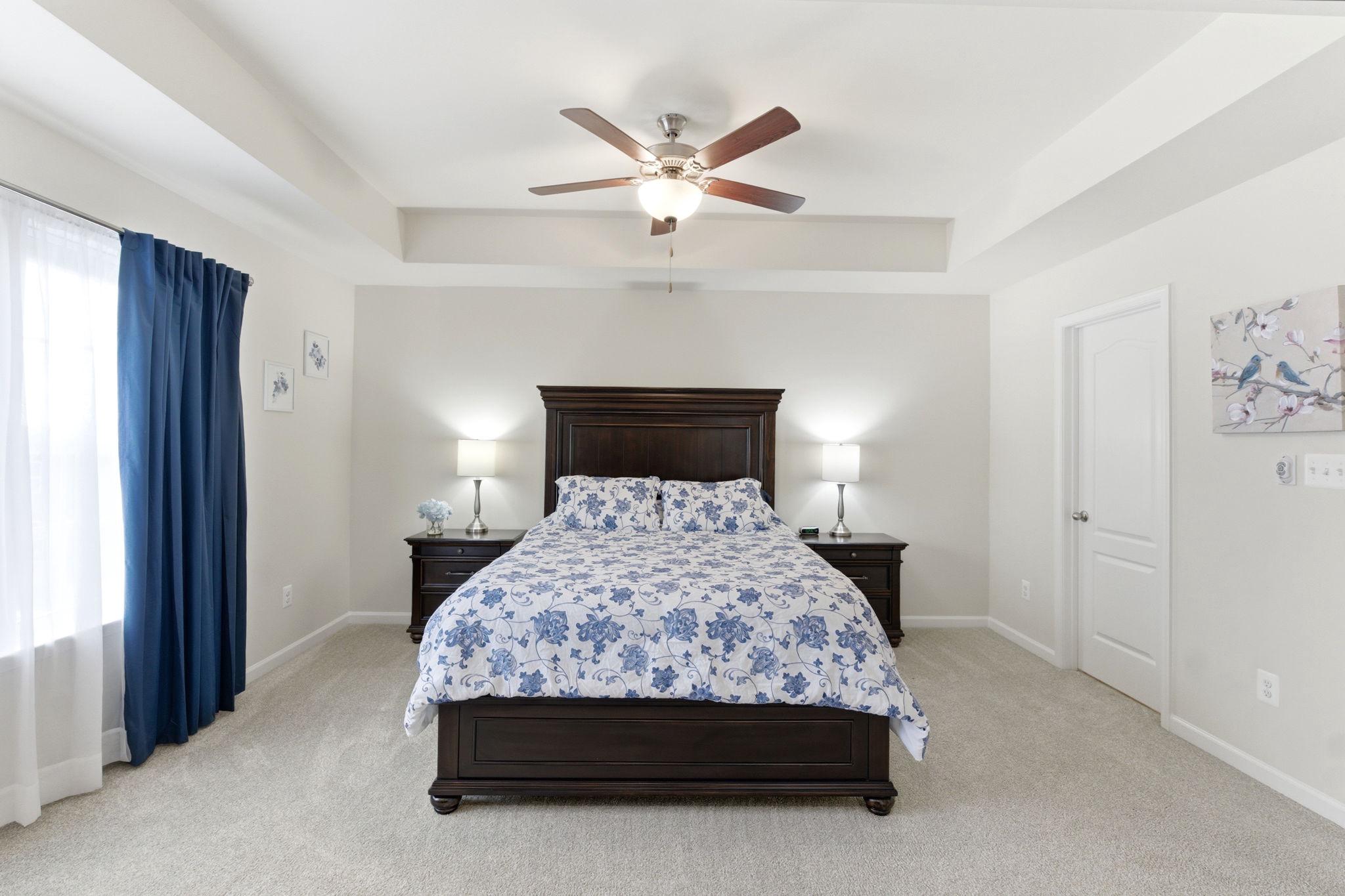 36 Tuxford Road Falling Waters, WV 25419 - Photo 13 of 33 Serene bedroom with natural light.