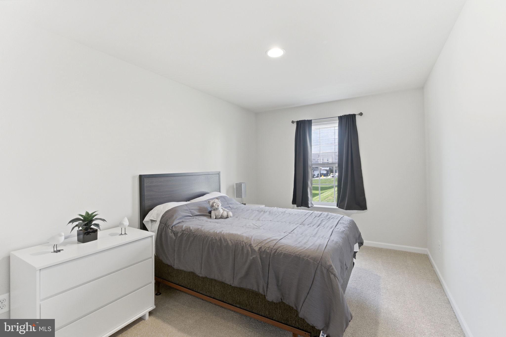 36 Tuxford Road Falling Waters, WV 25419 - Photo 19 of 33 Bright and inviting bedroom retreat.