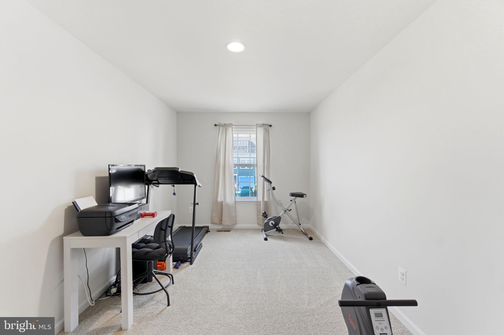 36 Tuxford Road Falling Waters, WV 25419 - Photo 22 of 33 Versatile space for work and wellness.