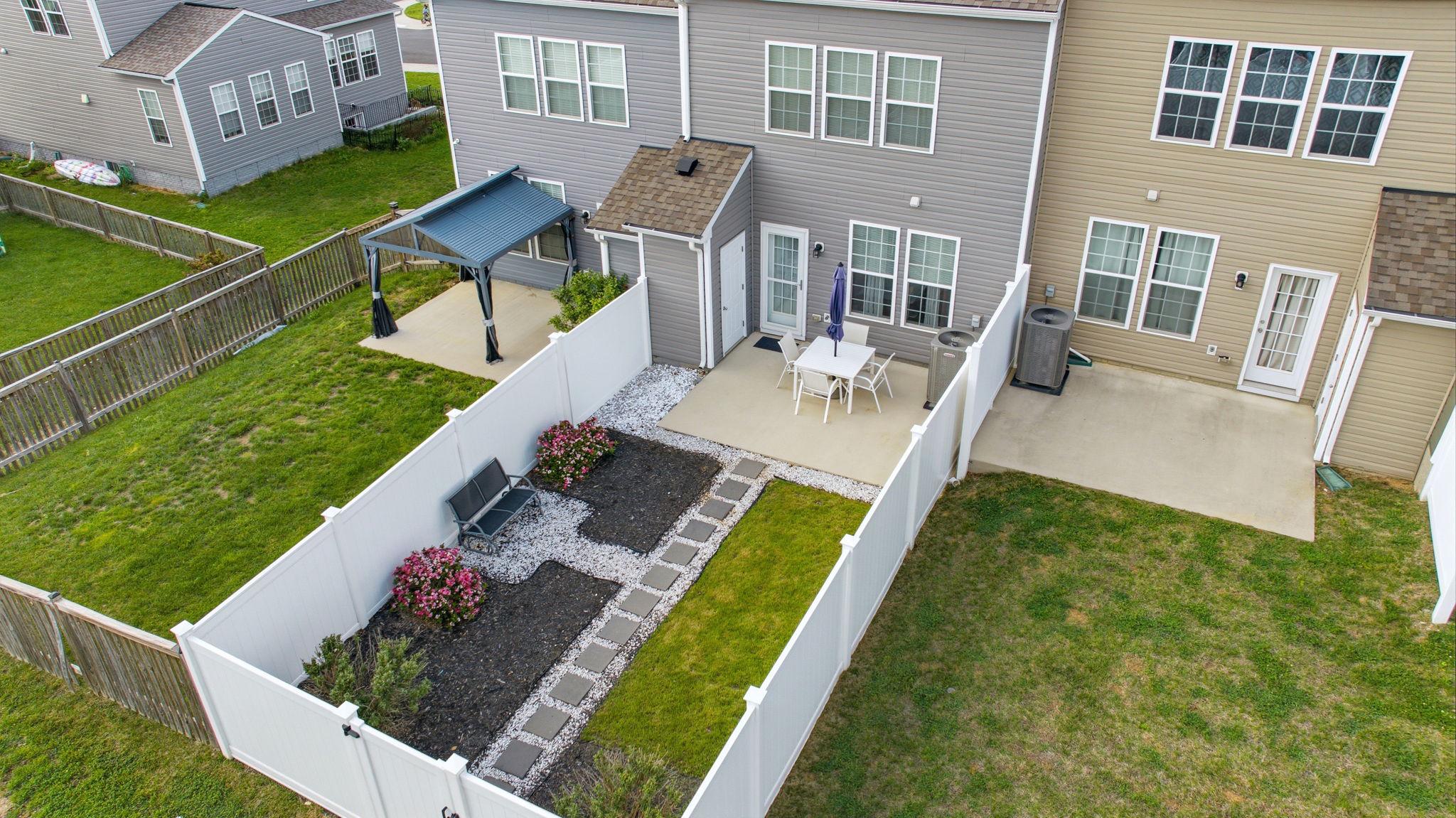 36 Tuxford Road Falling Waters, WV 25419 - Photo 30 of 33 Beautifully landscaped rear yard.