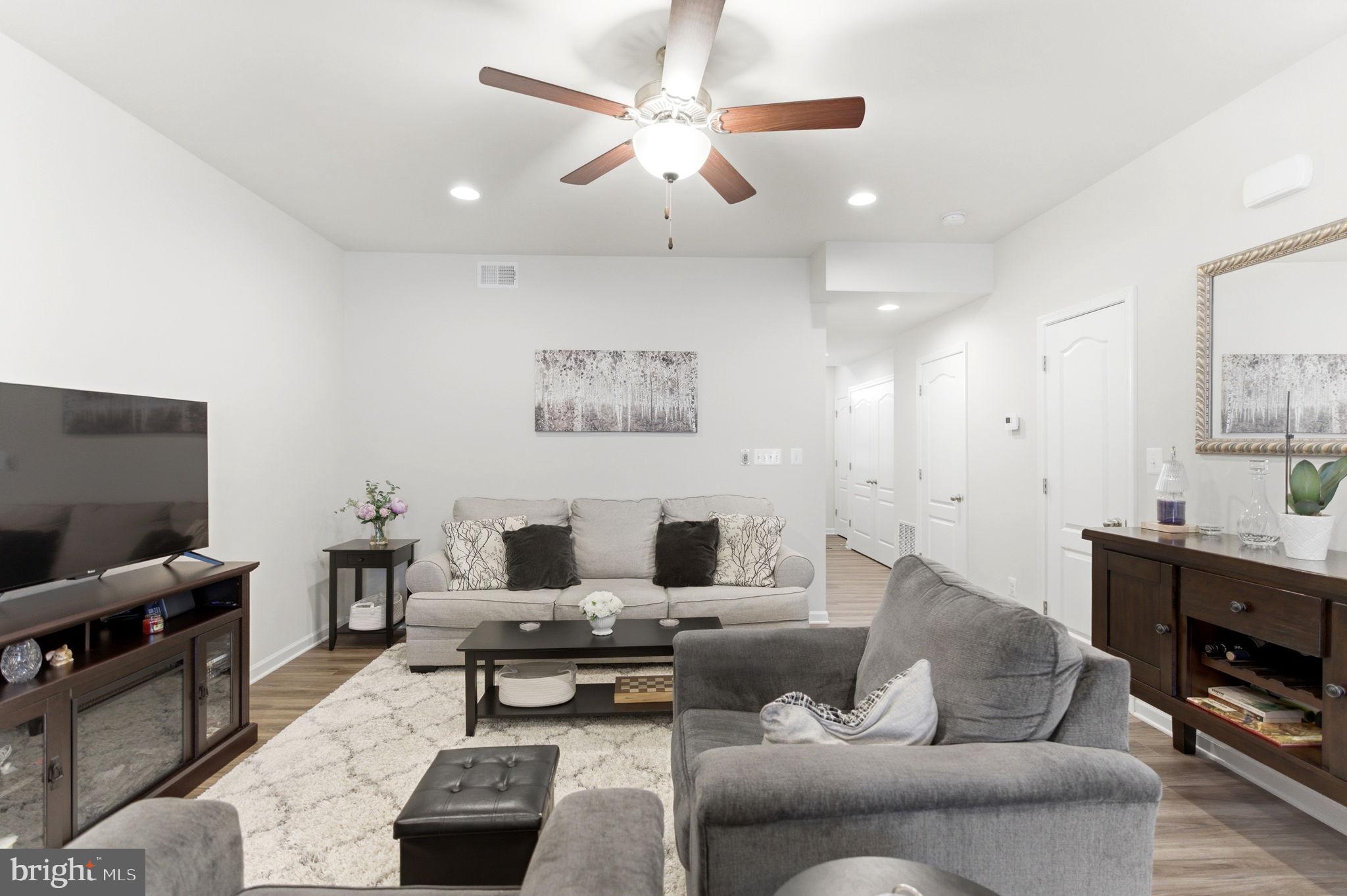 36 Tuxford Road Falling Waters, WV 25419 - Photo 5 of 33 Modern living space with cozy charm.