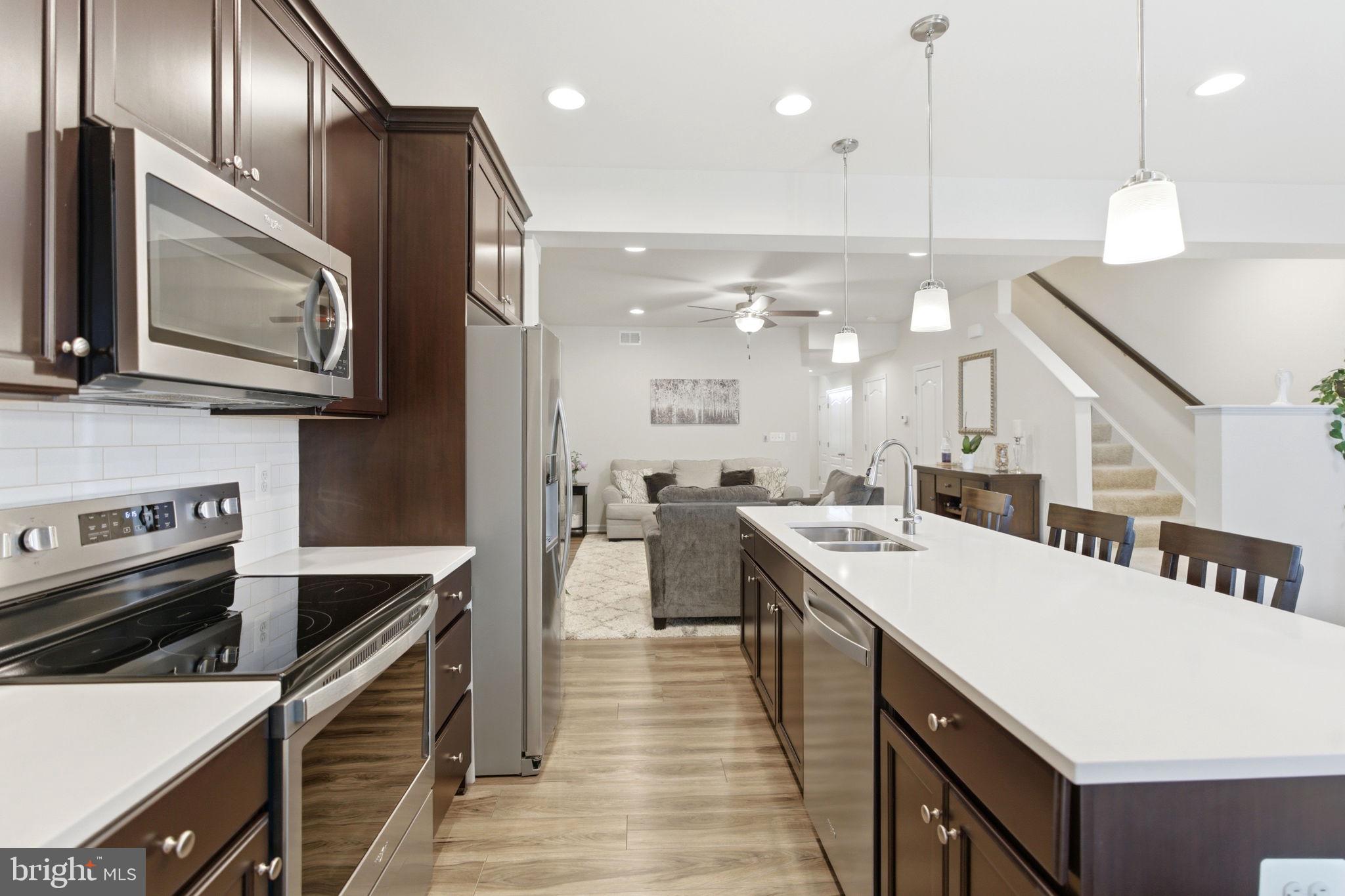 36 Tuxford Road Falling Waters, WV 25419 - Photo 7 of 33 Modern kitchen with sleek finishes.