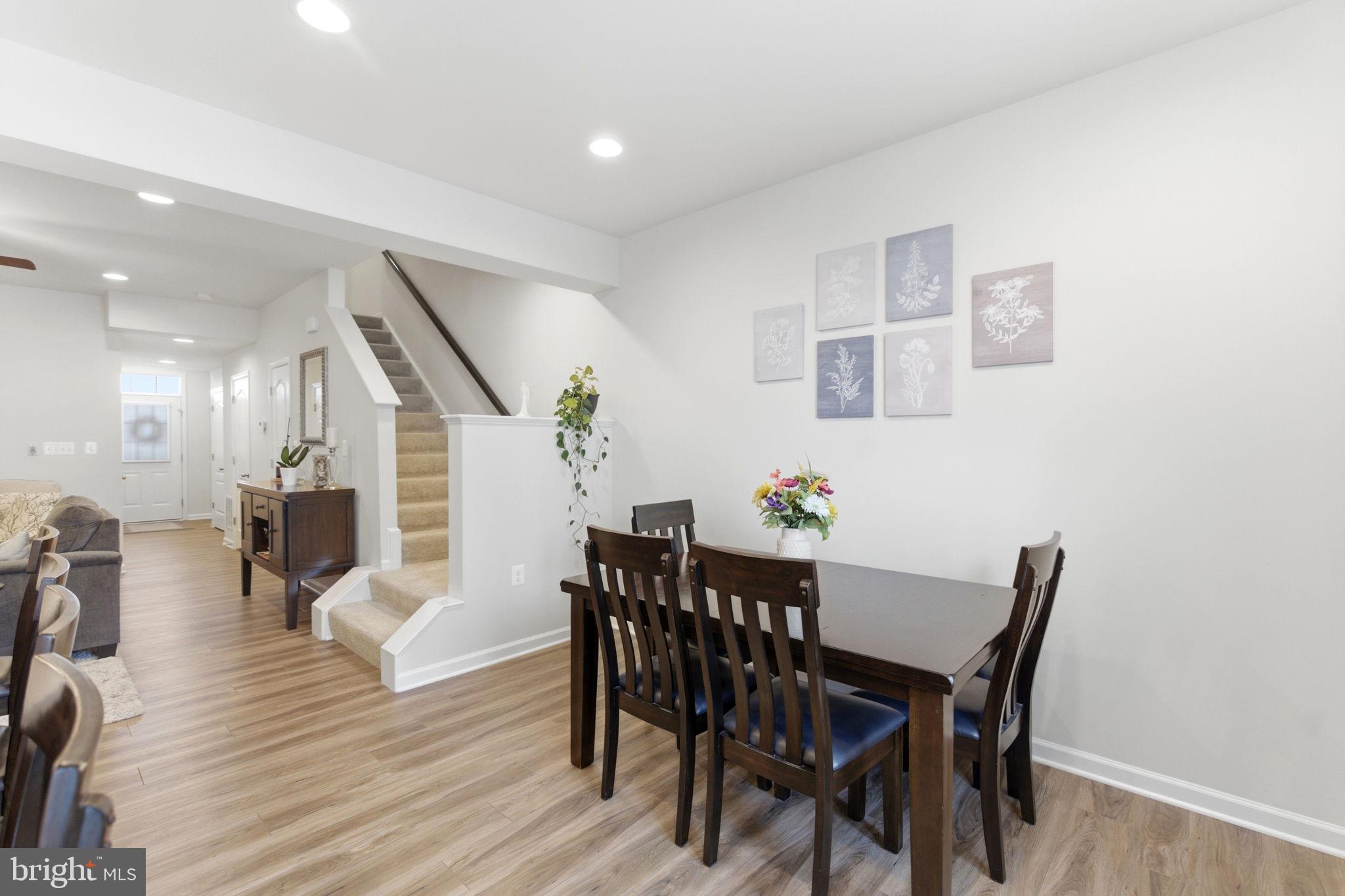 36 Tuxford Road Falling Waters, WV 25419 - Photo 10 of 33 Modern dining space with elegant decor.