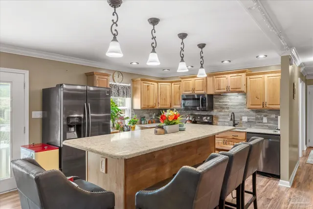 a view of a hallway with furniture and elevator