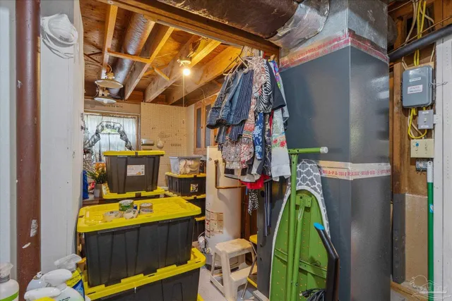 a view of a house with a yard porch and sitting area