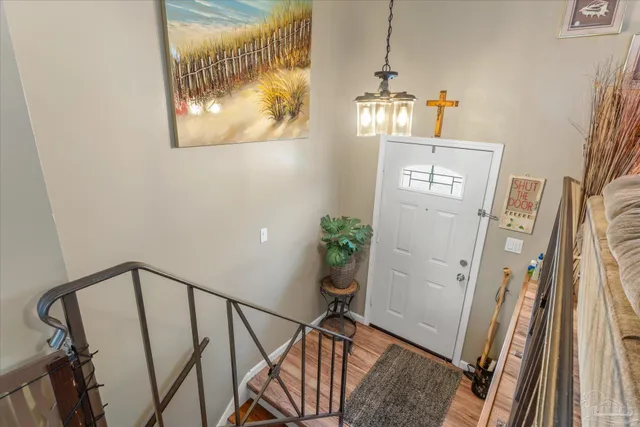 a view of an entryway with a flower pot