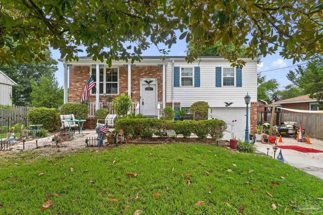 a view of sitting area in front of house