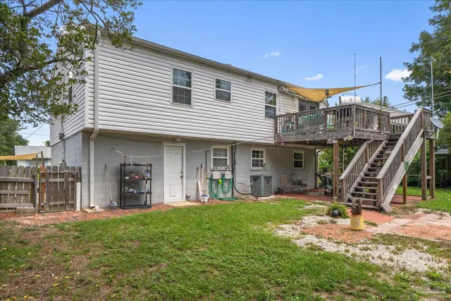 a view of swimming pool with sitting area