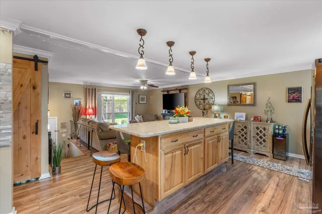 a view of a kitchen and dining area