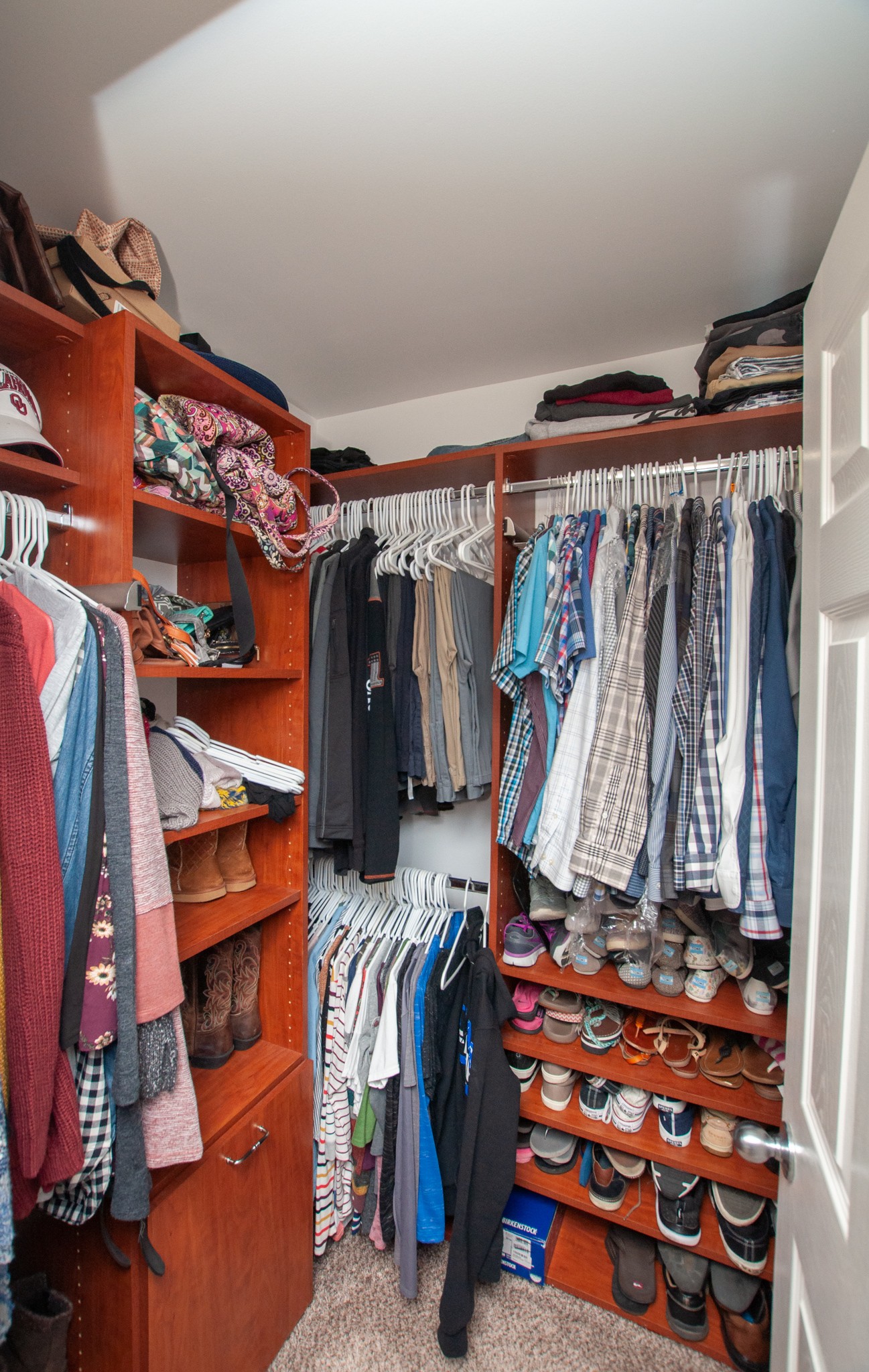 596 Windy Road Mount Juliet, TN 37122 - Photo 11 of 34 a view of walk in closet with clothes and shoes