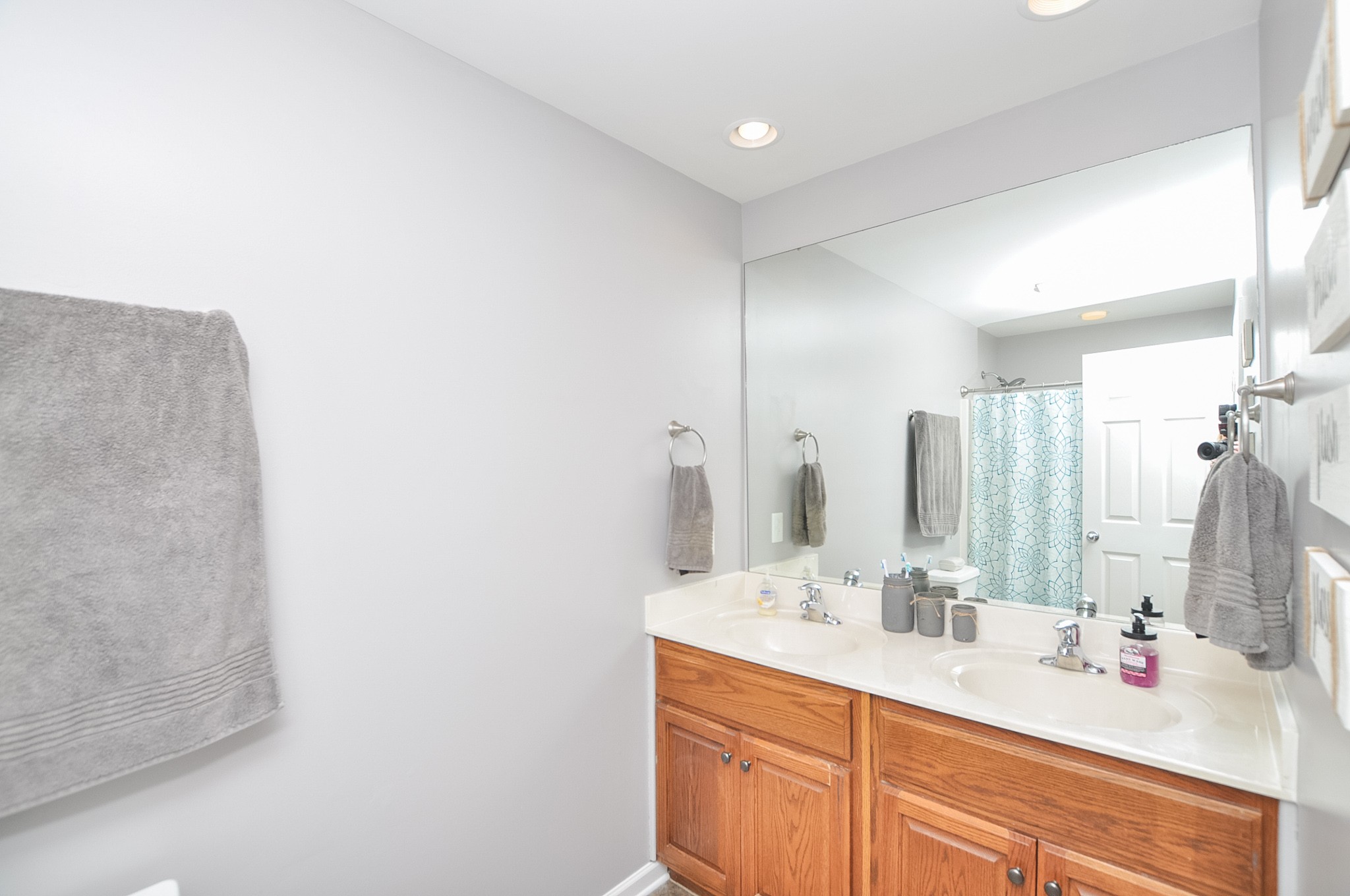 596 Windy Road Mount Juliet, TN 37122 - Photo 12 of 34 a bathroom with a double vanity sink mirror and double