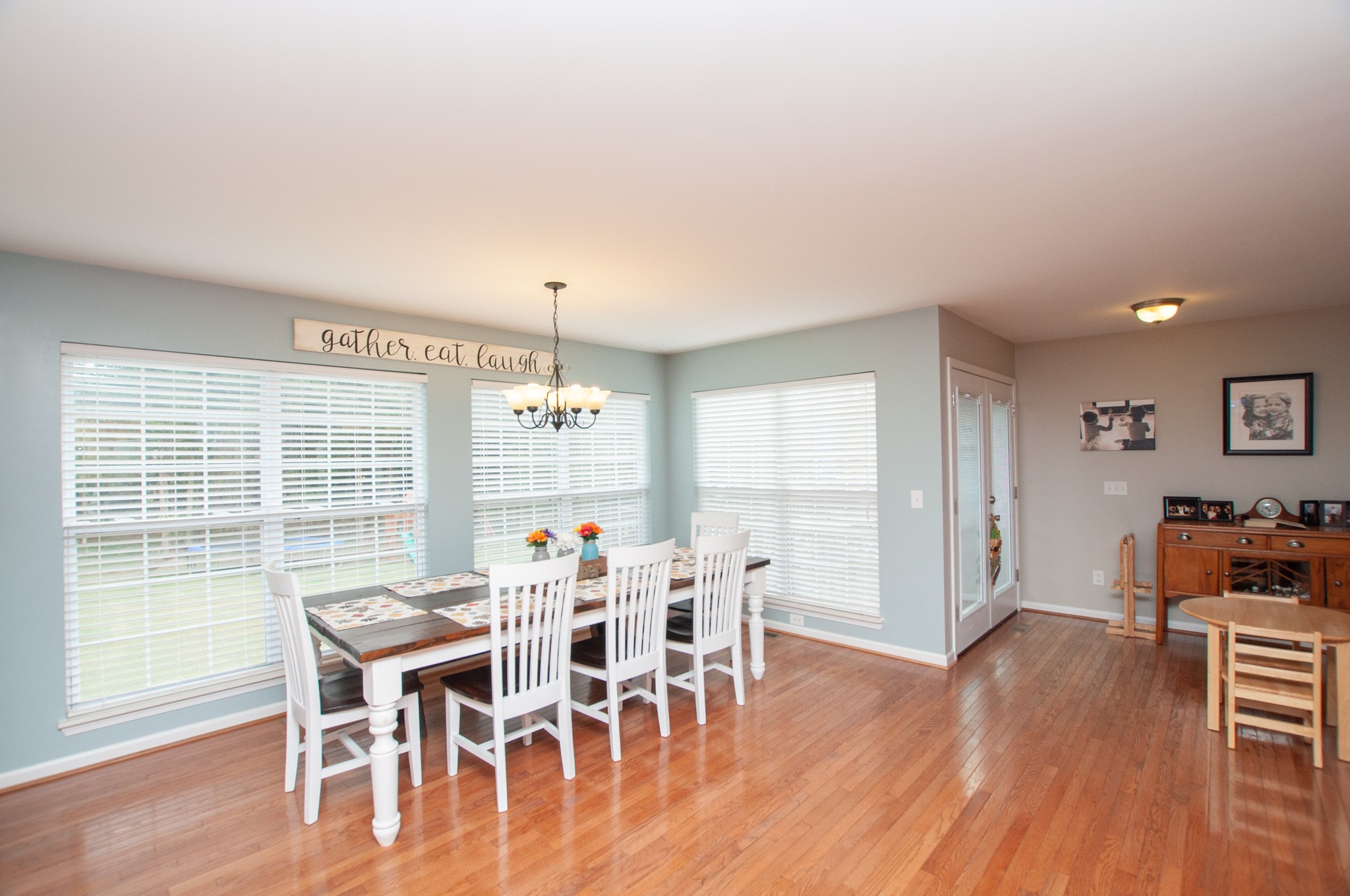 596 Windy Road Mount Juliet, TN 37122 - Photo 18 of 34 a dining room with furniture window wooden floor