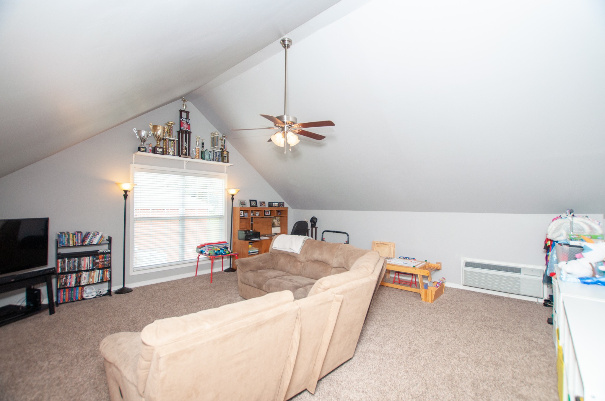 596 Windy Road Mount Juliet, TN 37122 - Photo 20 of 34 a living room with furniture and a flat screen tv