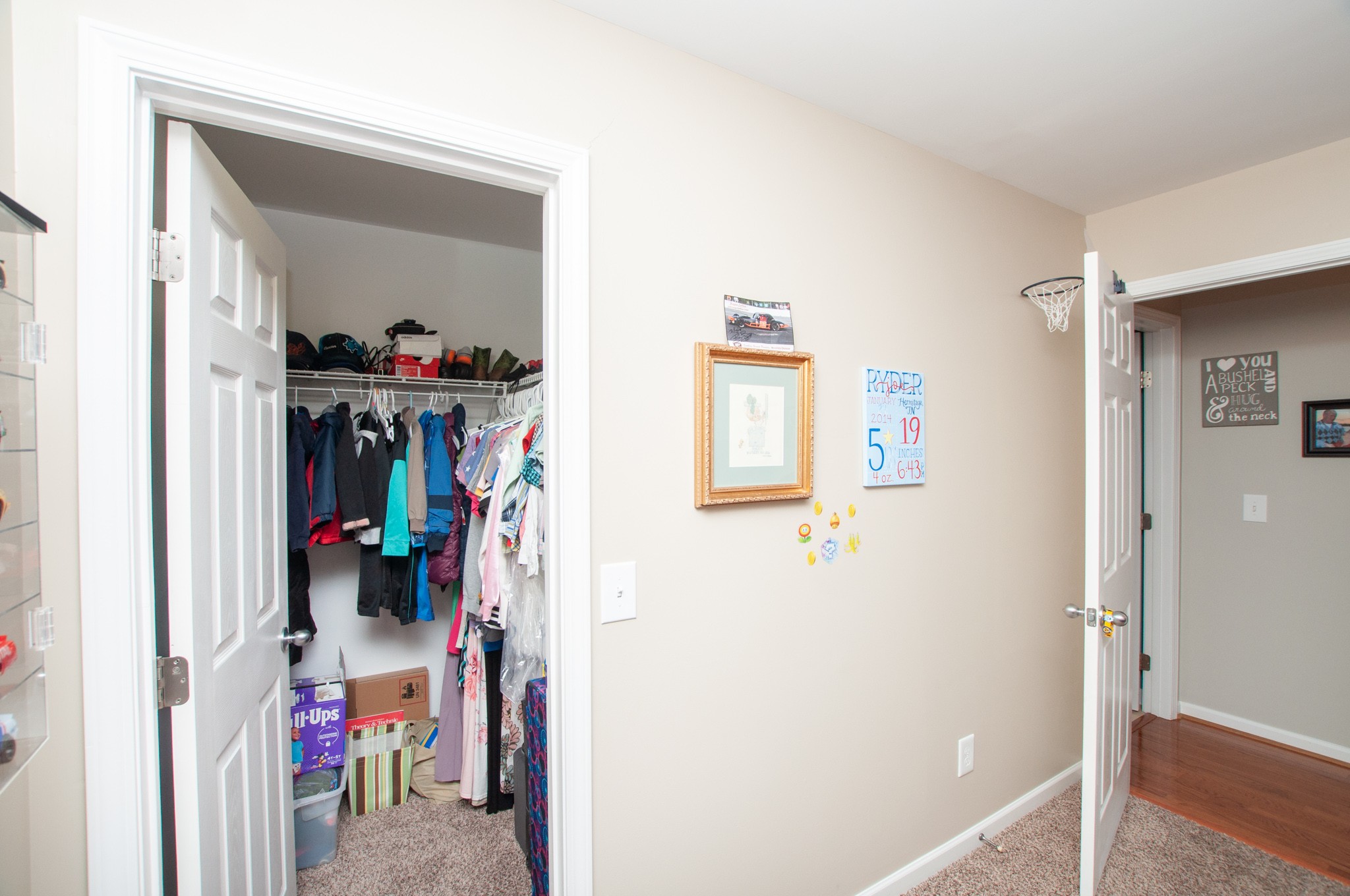 596 Windy Road Mount Juliet, TN 37122 - Photo 25 of 34 a view of walk in closet with clothes and shoes