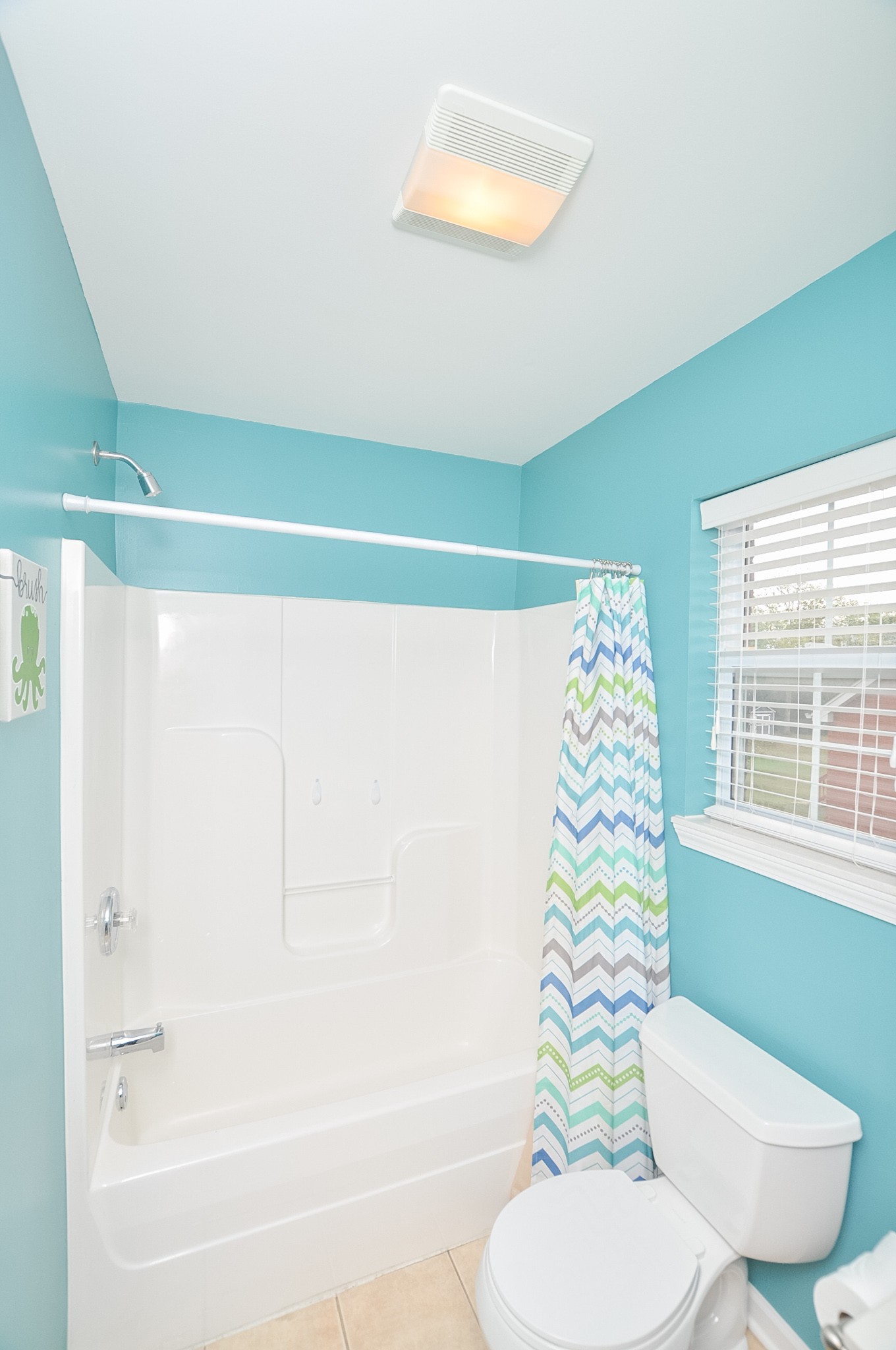 596 Windy Road Mount Juliet, TN 37122 - Photo 27 of 34 a bathroom with a sink toilet and shower