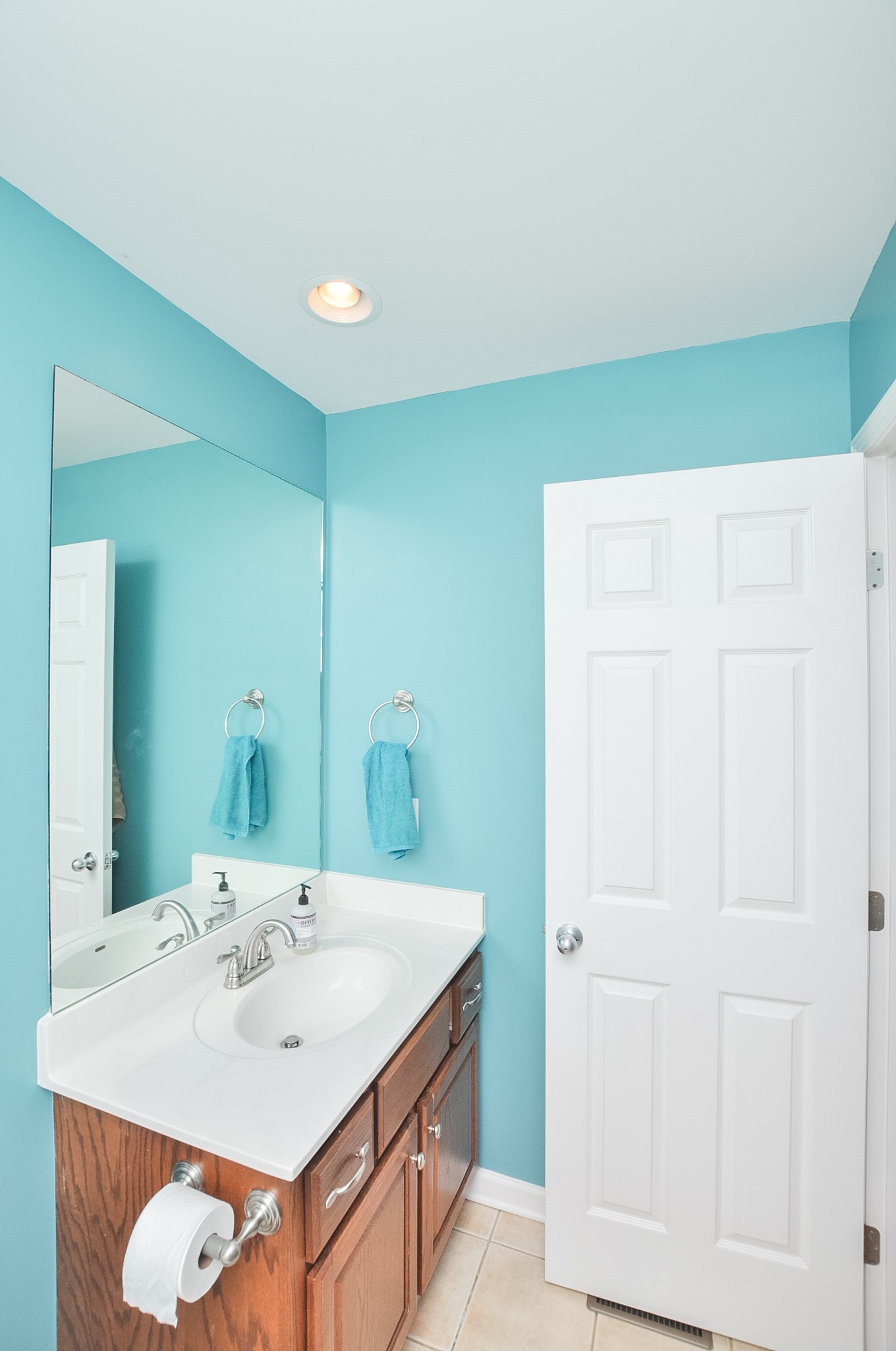 596 Windy Road Mount Juliet, TN 37122 - Photo 28 of 34 a bathroom with a sink and a mirror