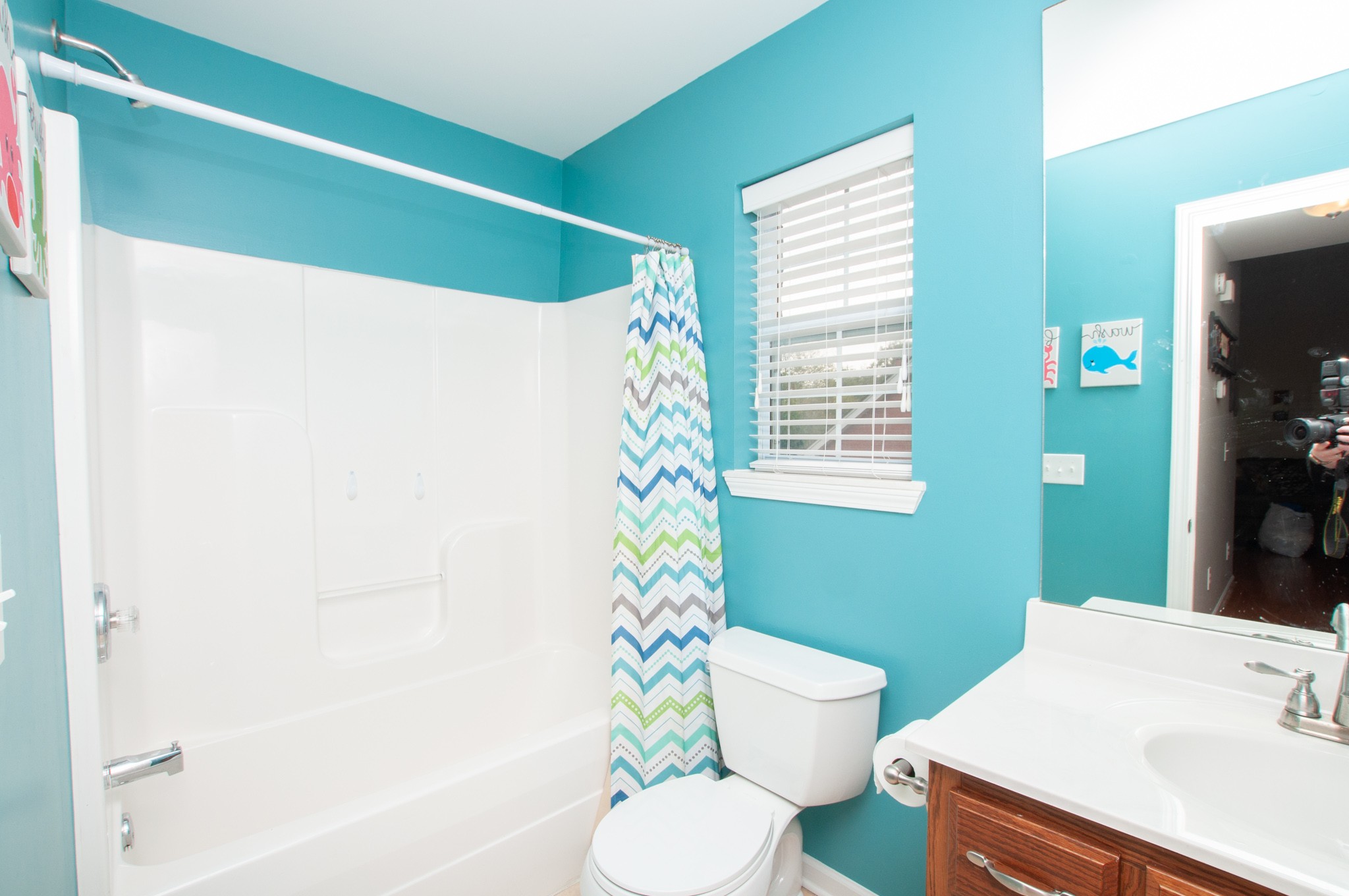 596 Windy Road Mount Juliet, TN 37122 - Photo 29 of 34 a bathroom with a sink toilet and shower