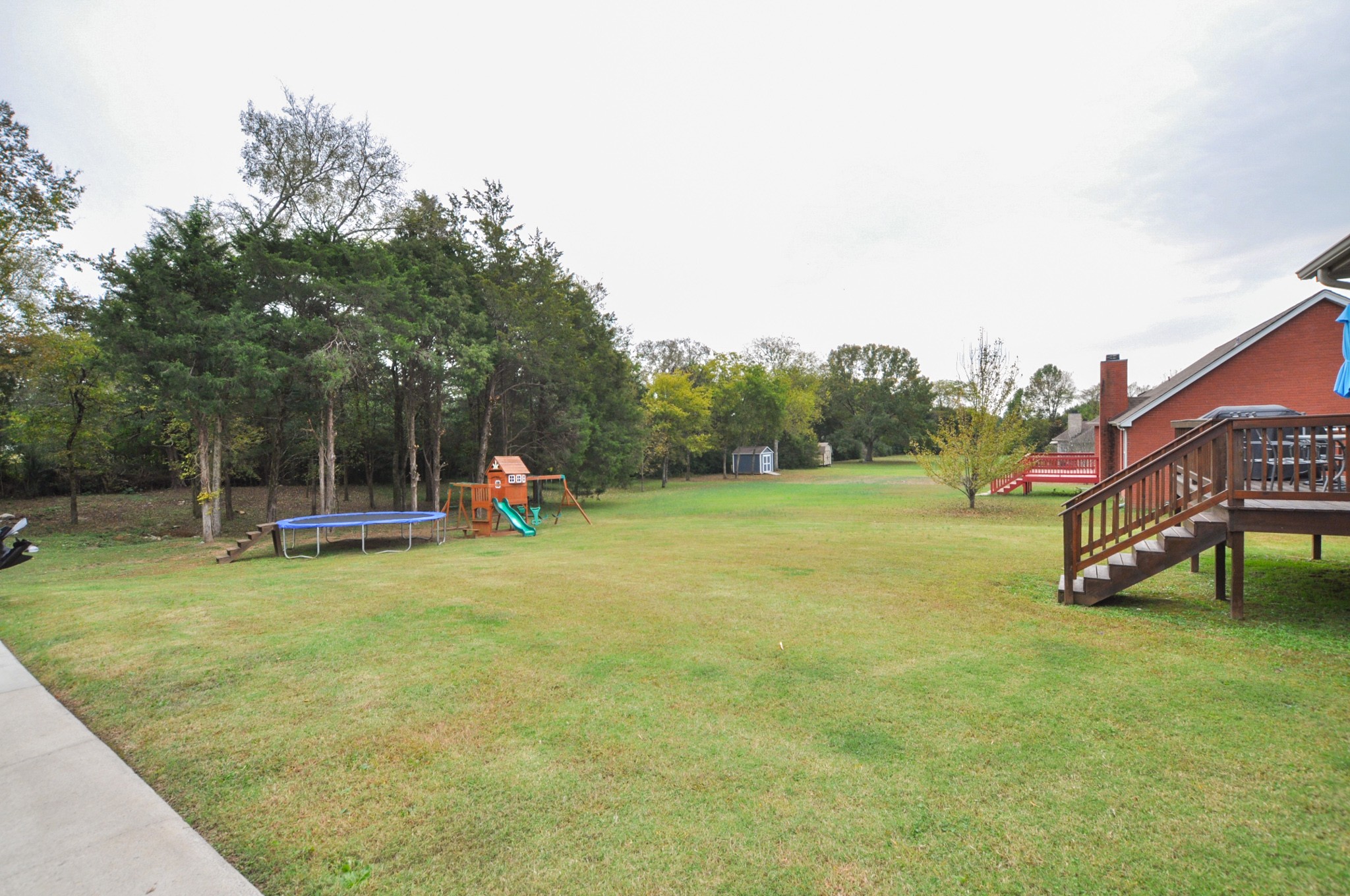 596 Windy Road Mount Juliet, TN 37122 - Photo 34 of 34 a childrens park with lots of swings and slides
