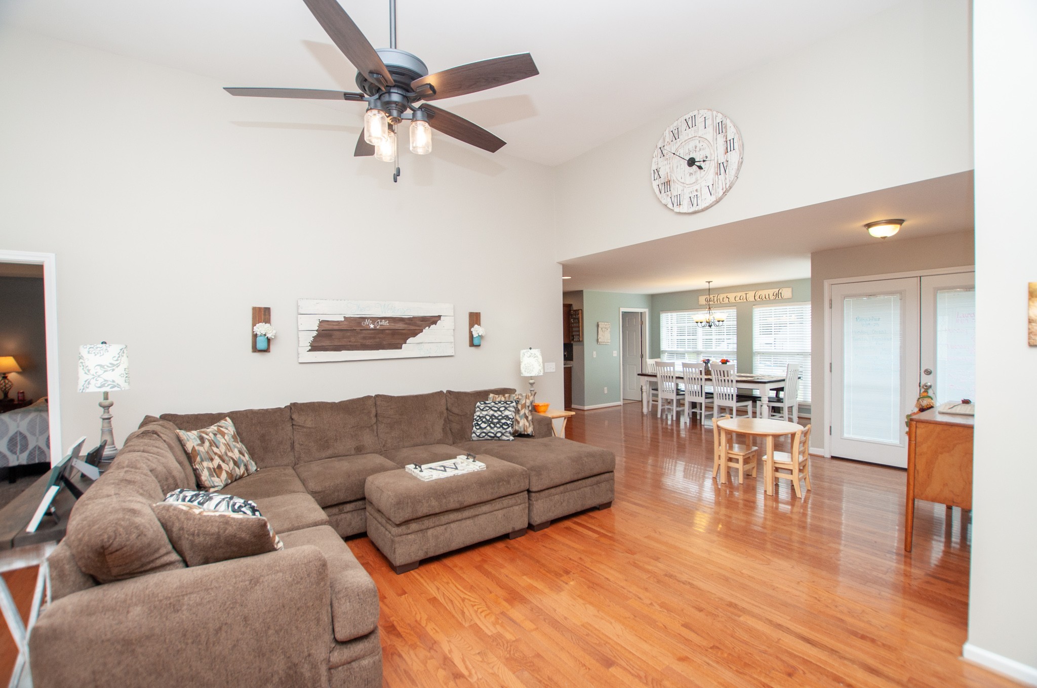596 Windy Road Mount Juliet, TN 37122 - Photo 8 of 34 a living room with furniture and wooden floor