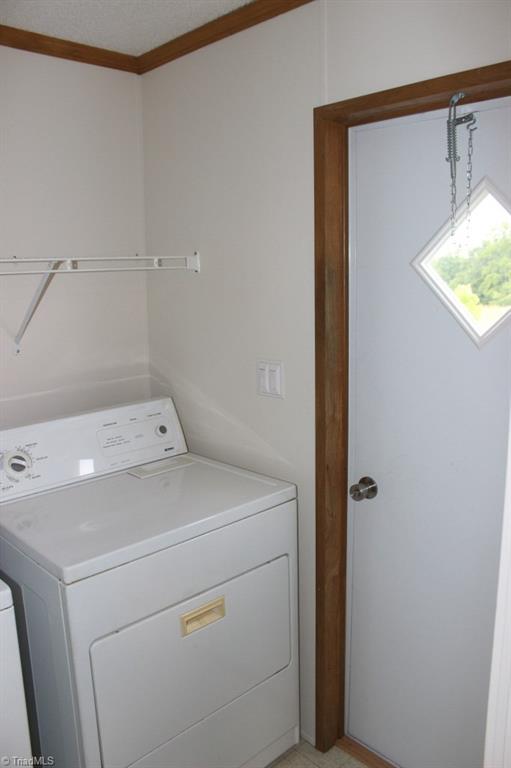 1040 Countryrock Road Germanton, NC 27019 - Photo 22 of 22 Laundry room includes washer and dryer that convey with the property