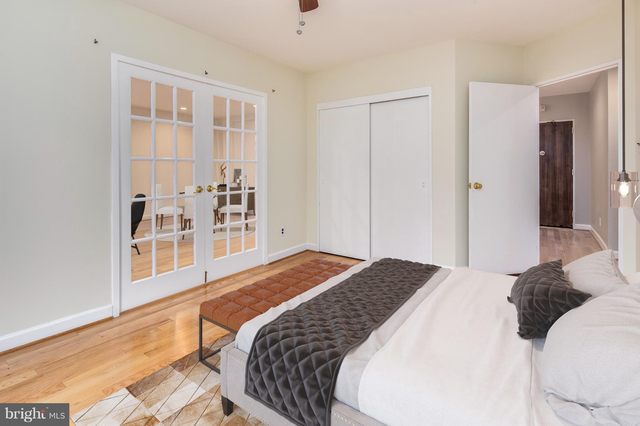 2475 Virginia Avenue Northwest, Unit 103 Washington, DC 20037 - Photo 11 of 16 a bedroom with a bed and a window