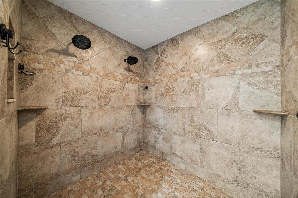 3125 Davis Road Mims, FL 32754 - Photo 12 of 46 a bathroom with a shower