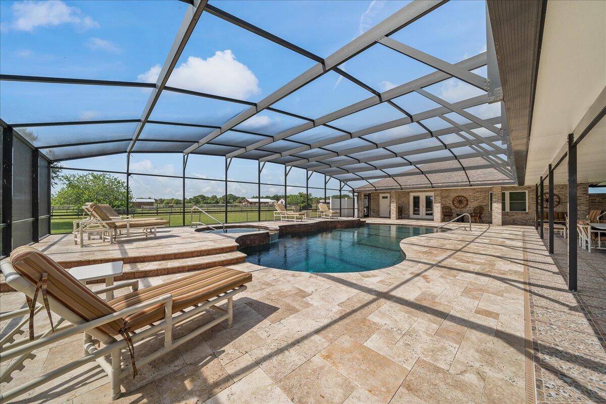 3125 Davis Road Mims, FL 32754 - Photo 26 of 46 a view of a swimming pool with a patio