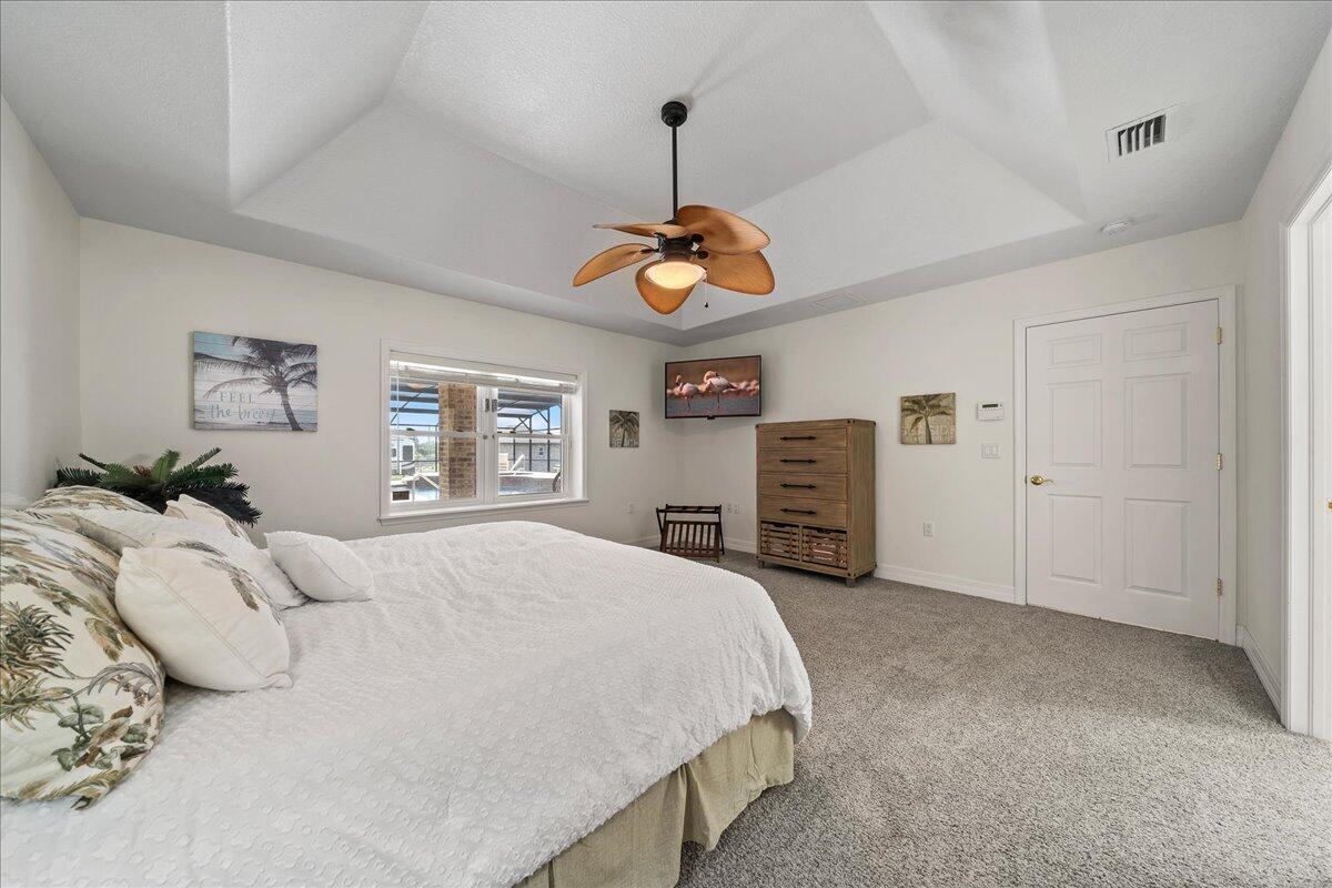 3125 Davis Road Mims, FL 32754 - Photo 32 of 46 a bedroom with a bed and a window