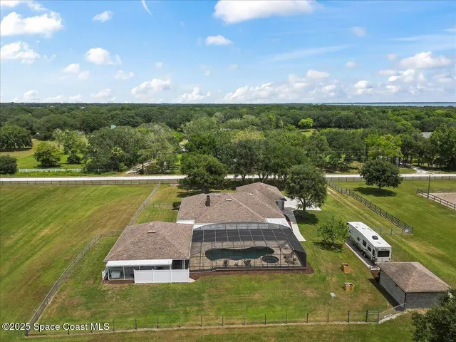 a view of a garden with an outdoor space