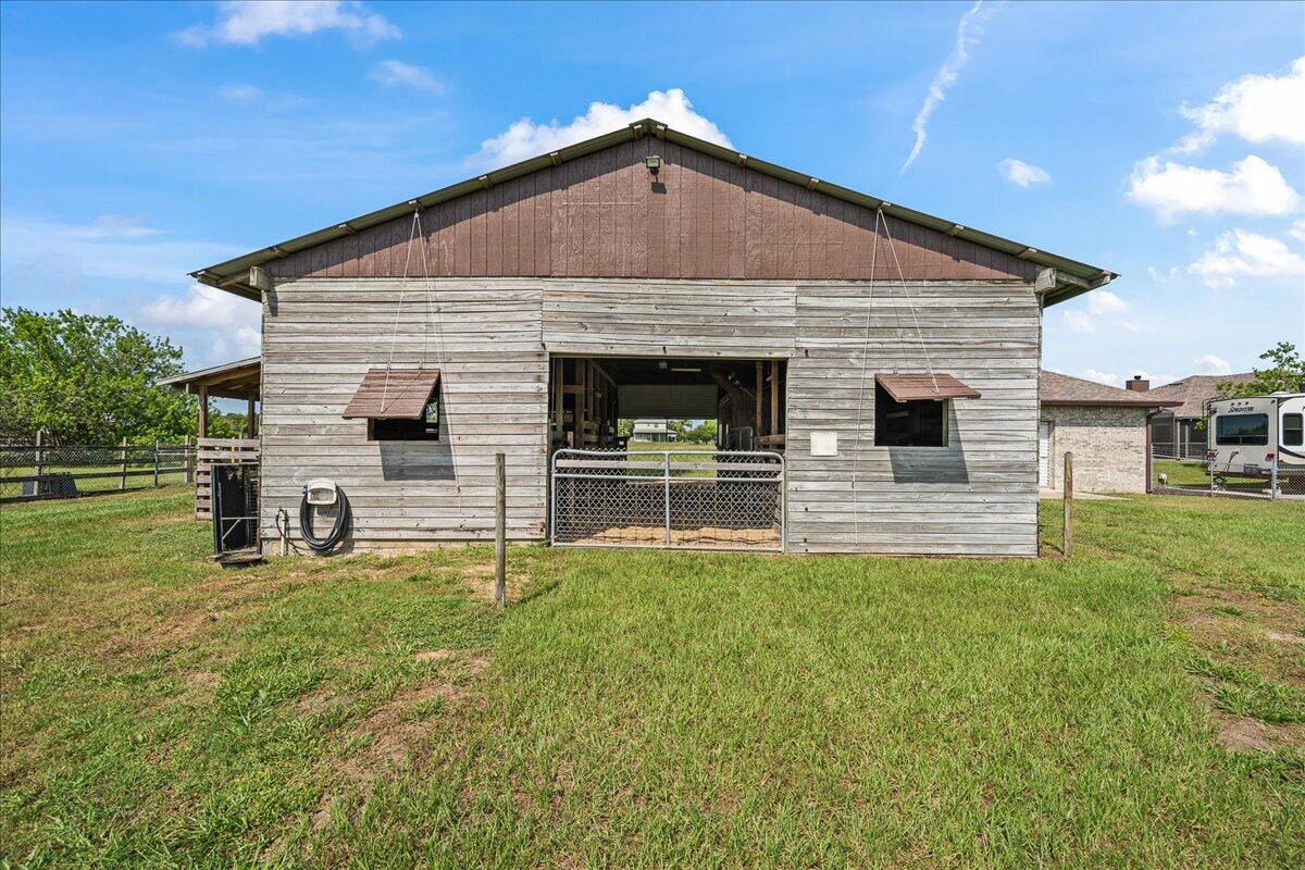 3125 Davis Road Mims, FL 32754 - Photo 41 of 46 a front view of a house with a yard