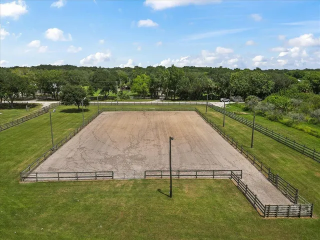 a view of a swimming pool with a garden