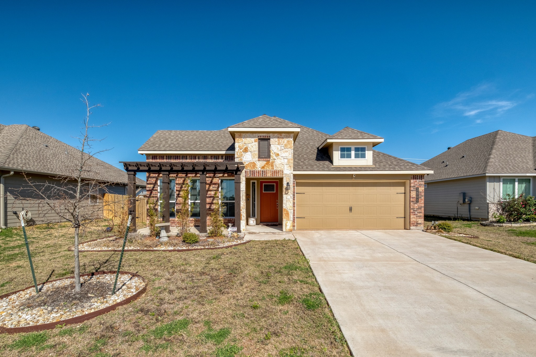 3500 Beutel Road Lorena, TX 76655 - Photo 2 of 27 View of front facade with driveway, a front yard, a garage, and roof with shingles