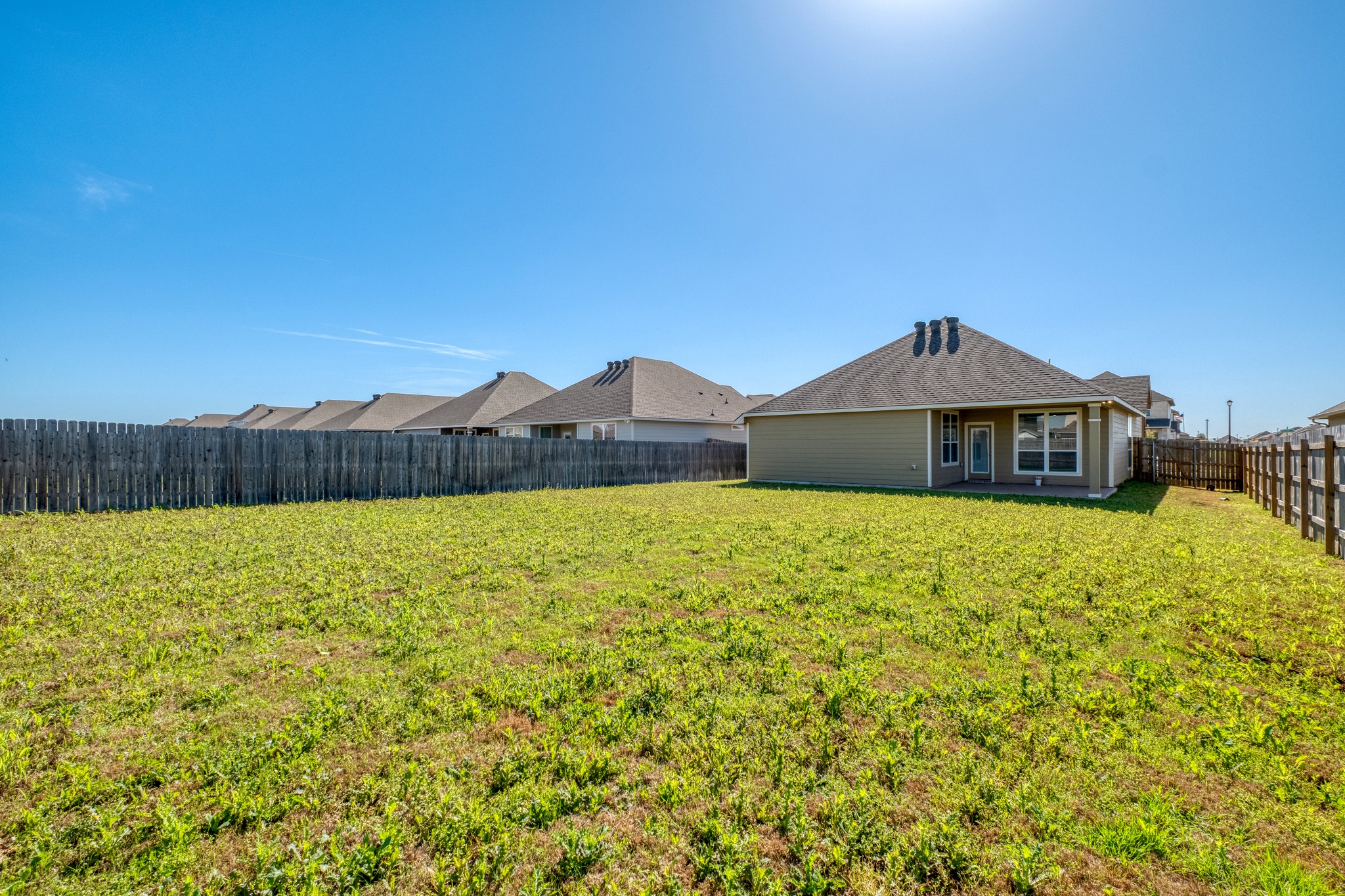 3500 Beutel Road Lorena, TX 76655 - Photo 25 of 27 Fenced backyard featuring a patio area