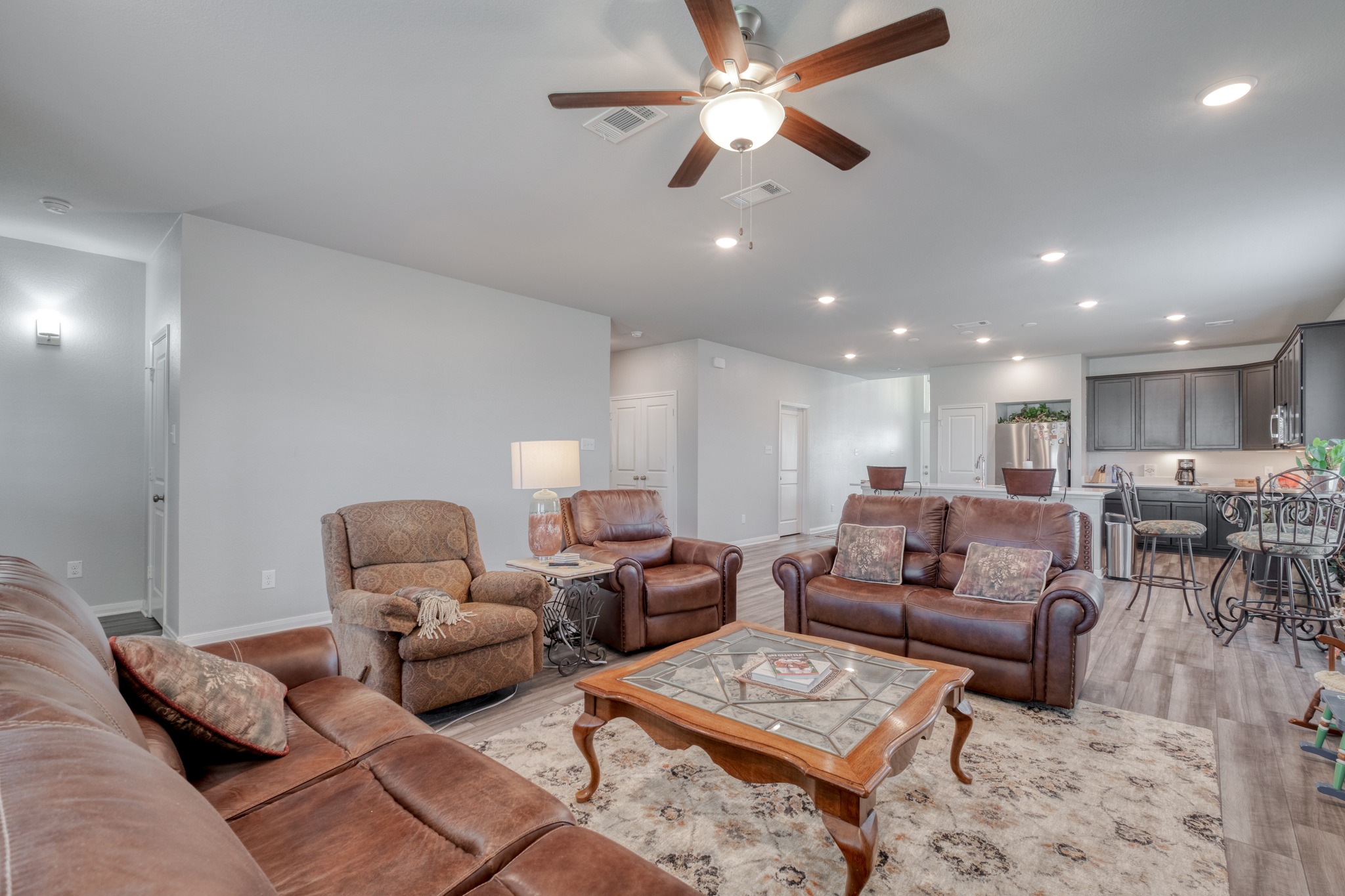 3500 Beutel Road Lorena, TX 76655 - Photo 8 of 27 Living area with a ceiling fan, light wood-style floors, and recessed lighting