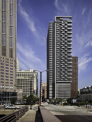 235 West Van Buren Street, Unit 2801 Chicago, IL 60607 - Photo 2 of 11 a front view of a building with a street