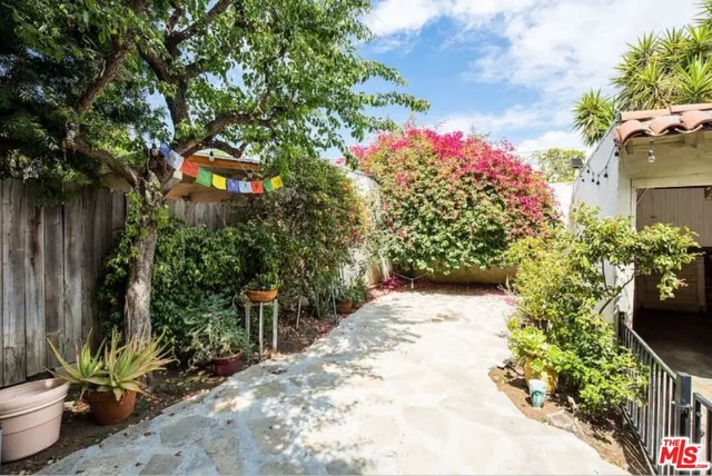 a front view of a building with parking space