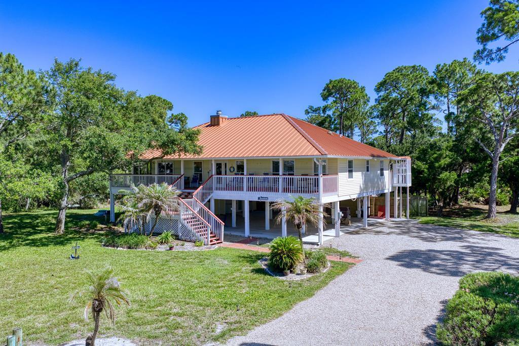 332 Cook Street St. George Island, FL 32328 - Photo 1 of 86