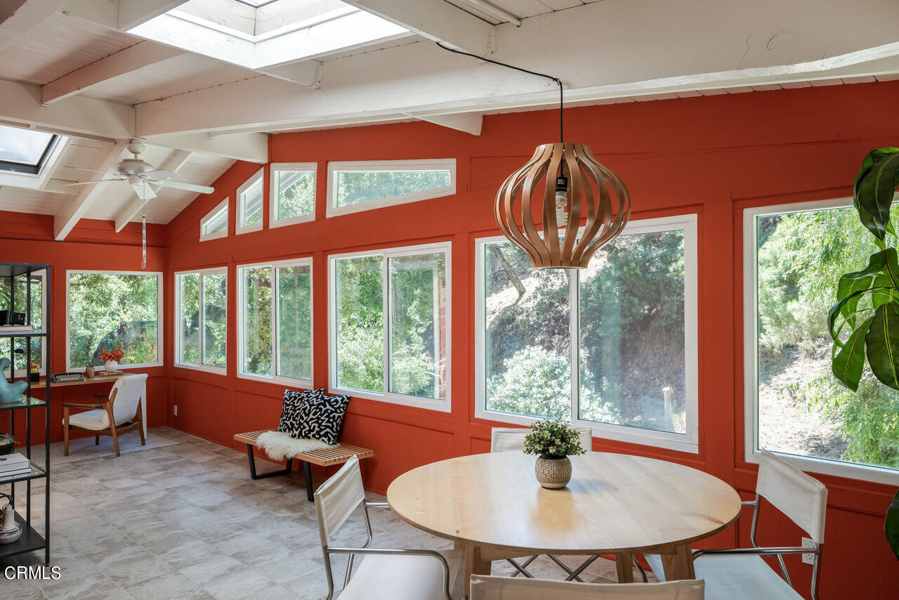 1453 Wicks Road Pasadena, CA 91103 - Photo 13 of 31 a dining room with a table and chairs