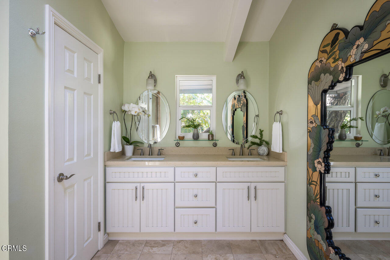 1453 Wicks Road Pasadena, CA 91103 - Photo 17 of 31 a bathroom with mirror and